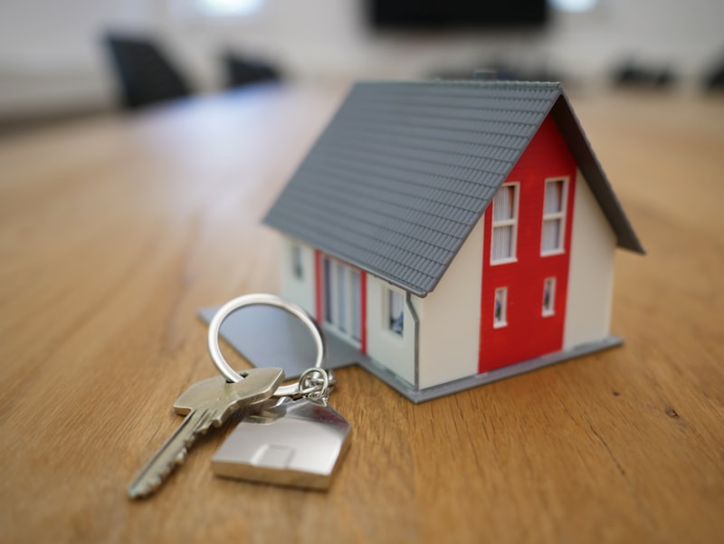 Happy buyers with keys to their new home